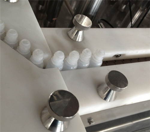 бөтелкені қысатын құрылғы